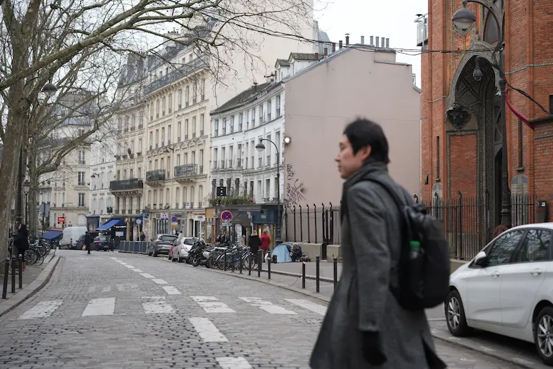 People walking through the streets of Paris